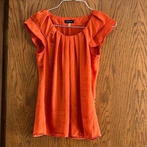 Cap sleeve orange blouse
